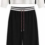 Costum Arhitectural Sport-Chic Two-Piece din Hanorac Supradimensionat cu Glugă și Inserție Stratificată și Pantaloni Larga cu Bandă Elastică în Nuanță Negru și Alb